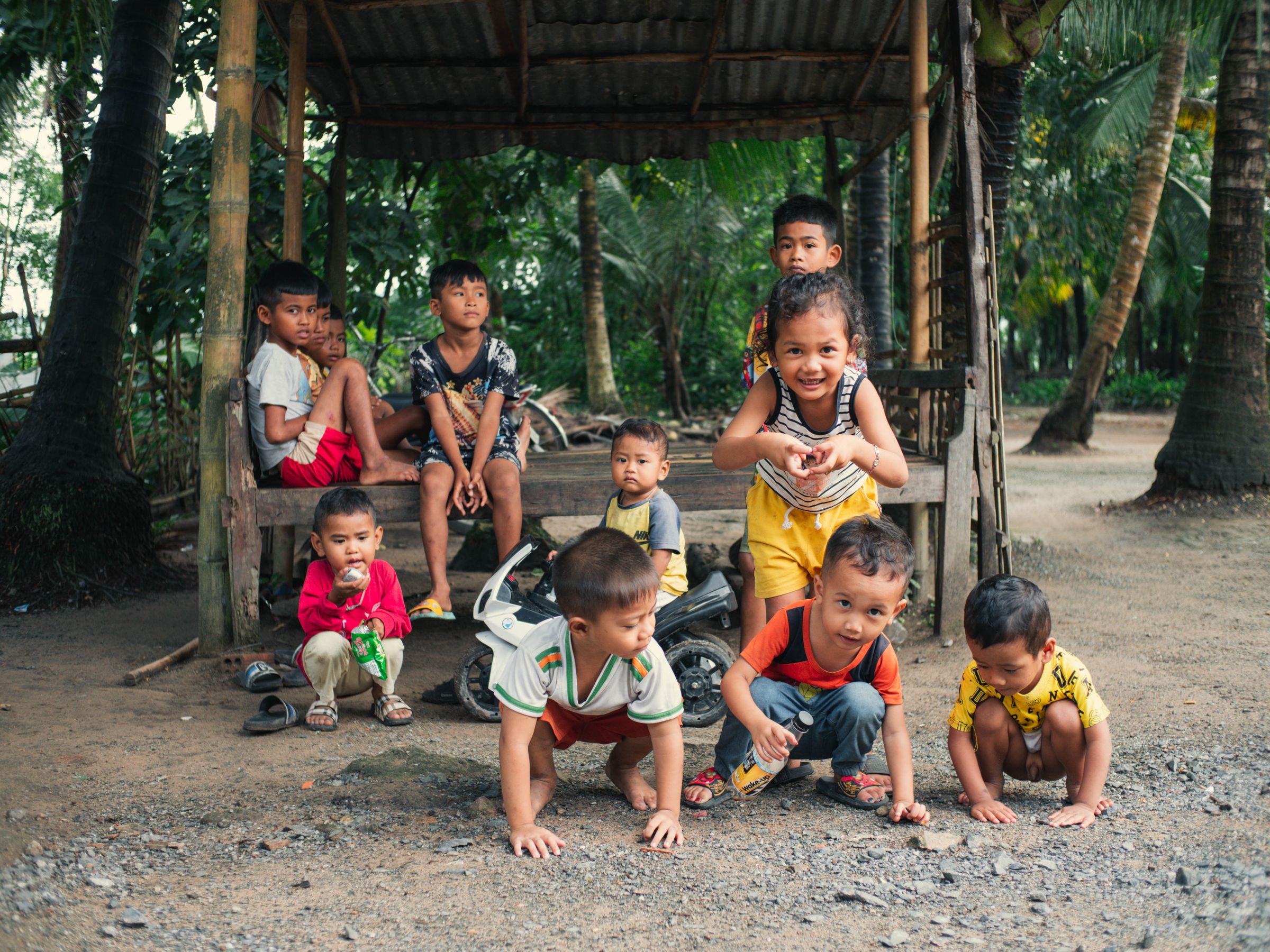 Children gathered in a rural overseas community
