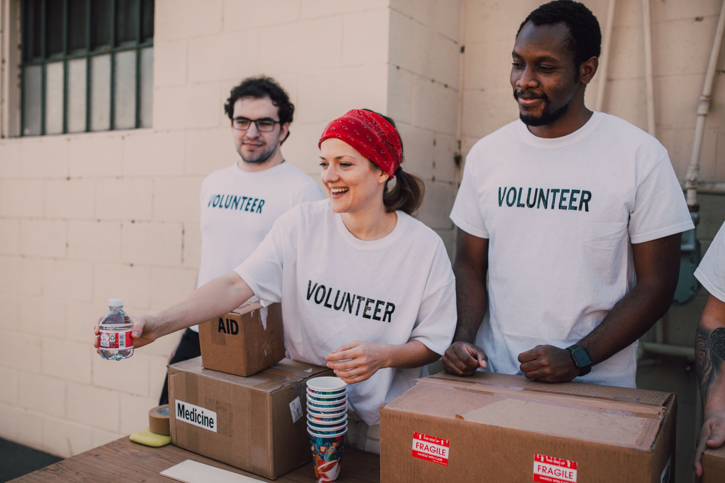 Volunteers preparing aid for distribution