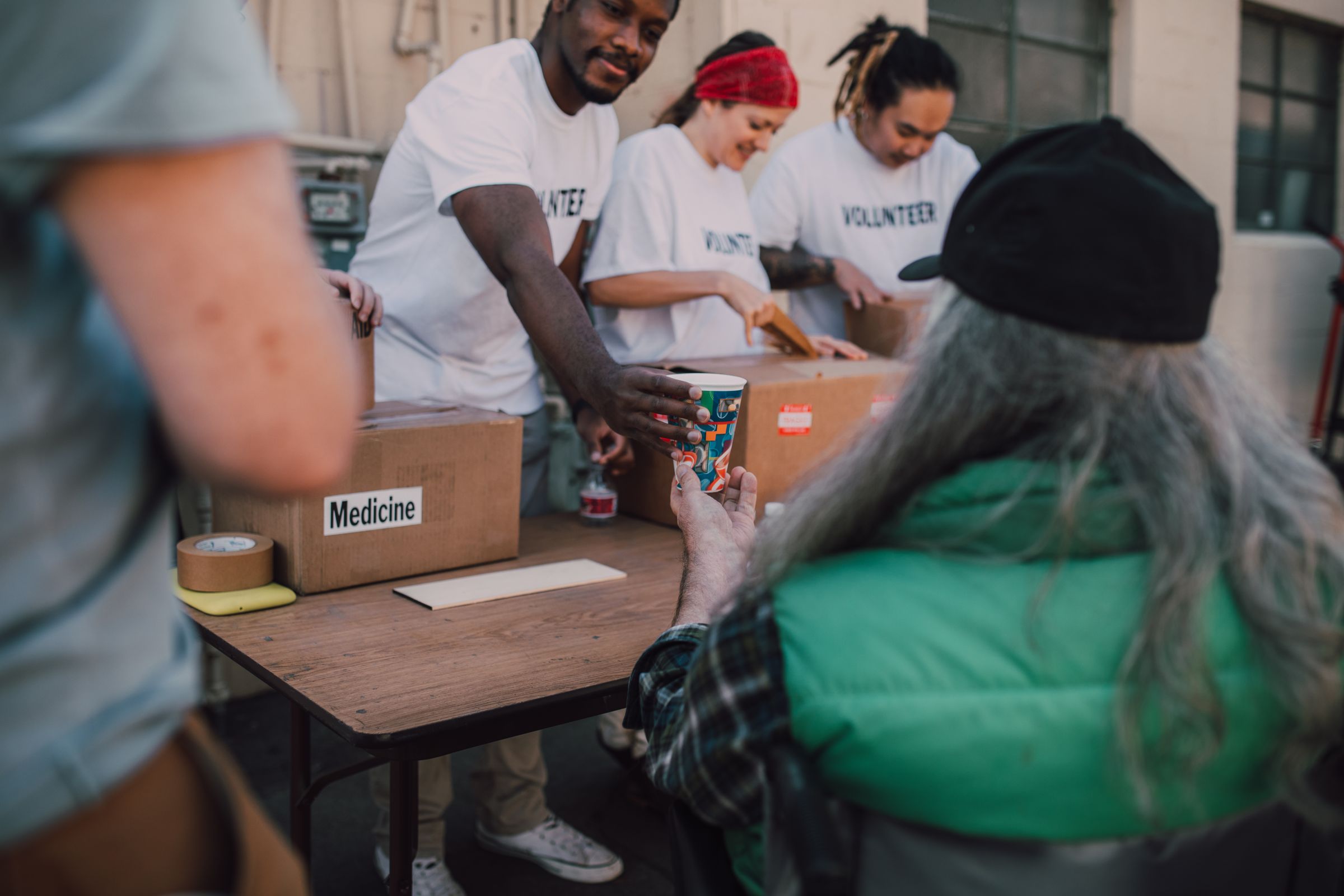 Volunteers distributing donations at a community event